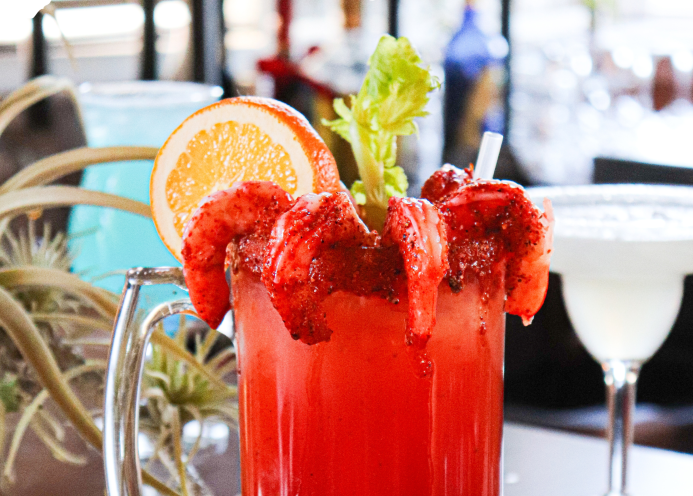 Camarones Michelada, shrimp, orange and celery at La Carreta.